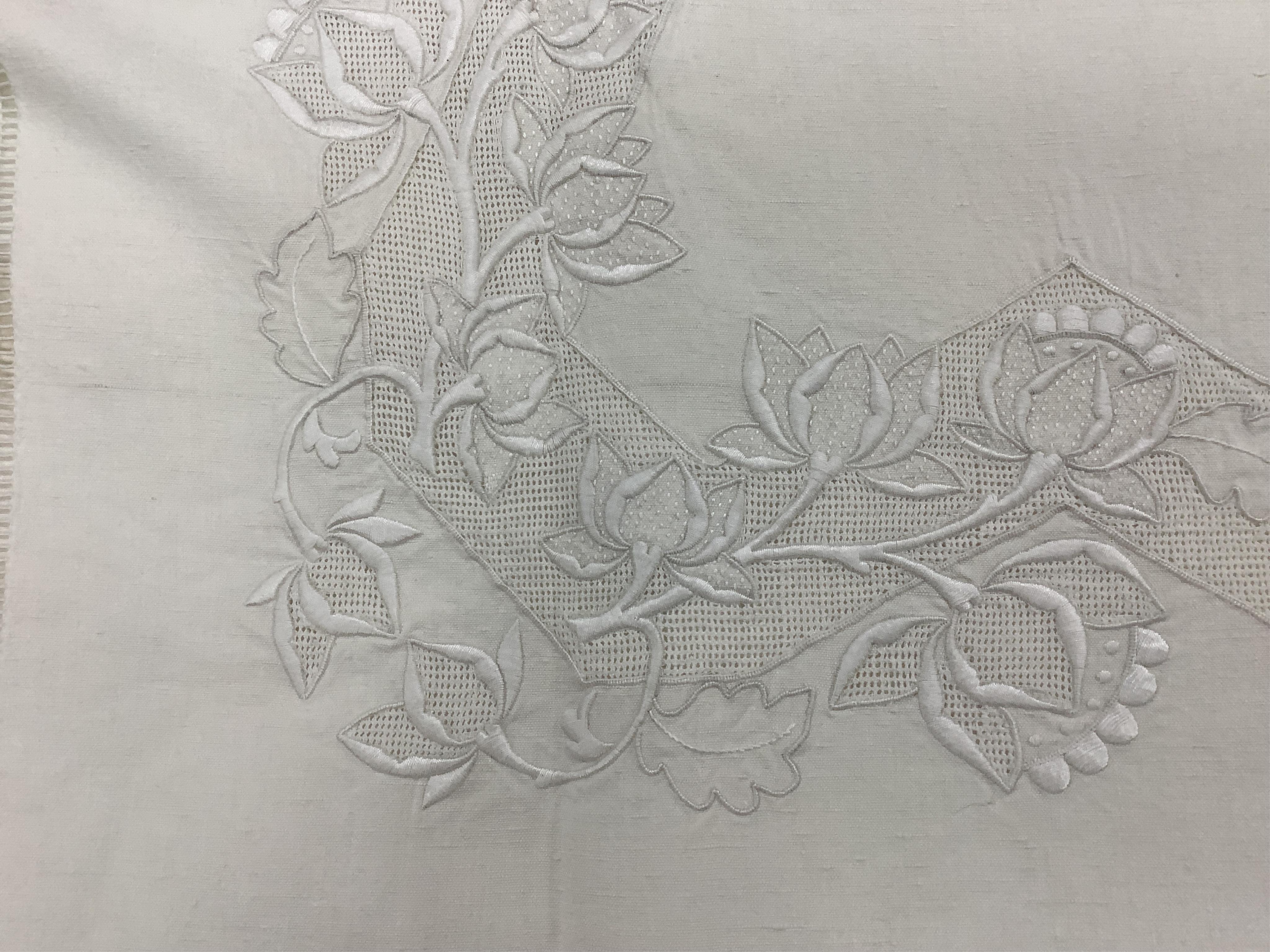 Four French provincial linen floral embroidered and drawn thread turn back, wide and long top sheets. Each sheet with different embroidery, dimensions and shades of linen, being ecru to off white. Condition - ecru sheet,
